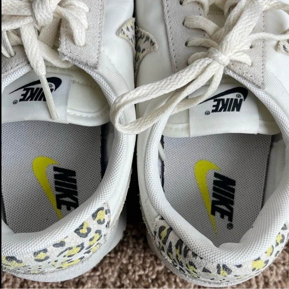 Nike Women's White and Gray Sneakers with Patterned Swoosh